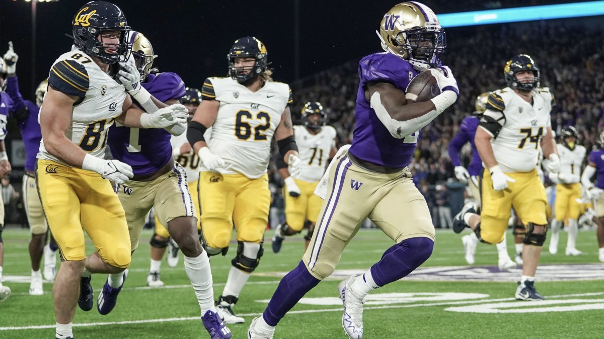 Linebacker Edefuan Ulofoshio heads for the end zone on a 45-yard interception return for a score.